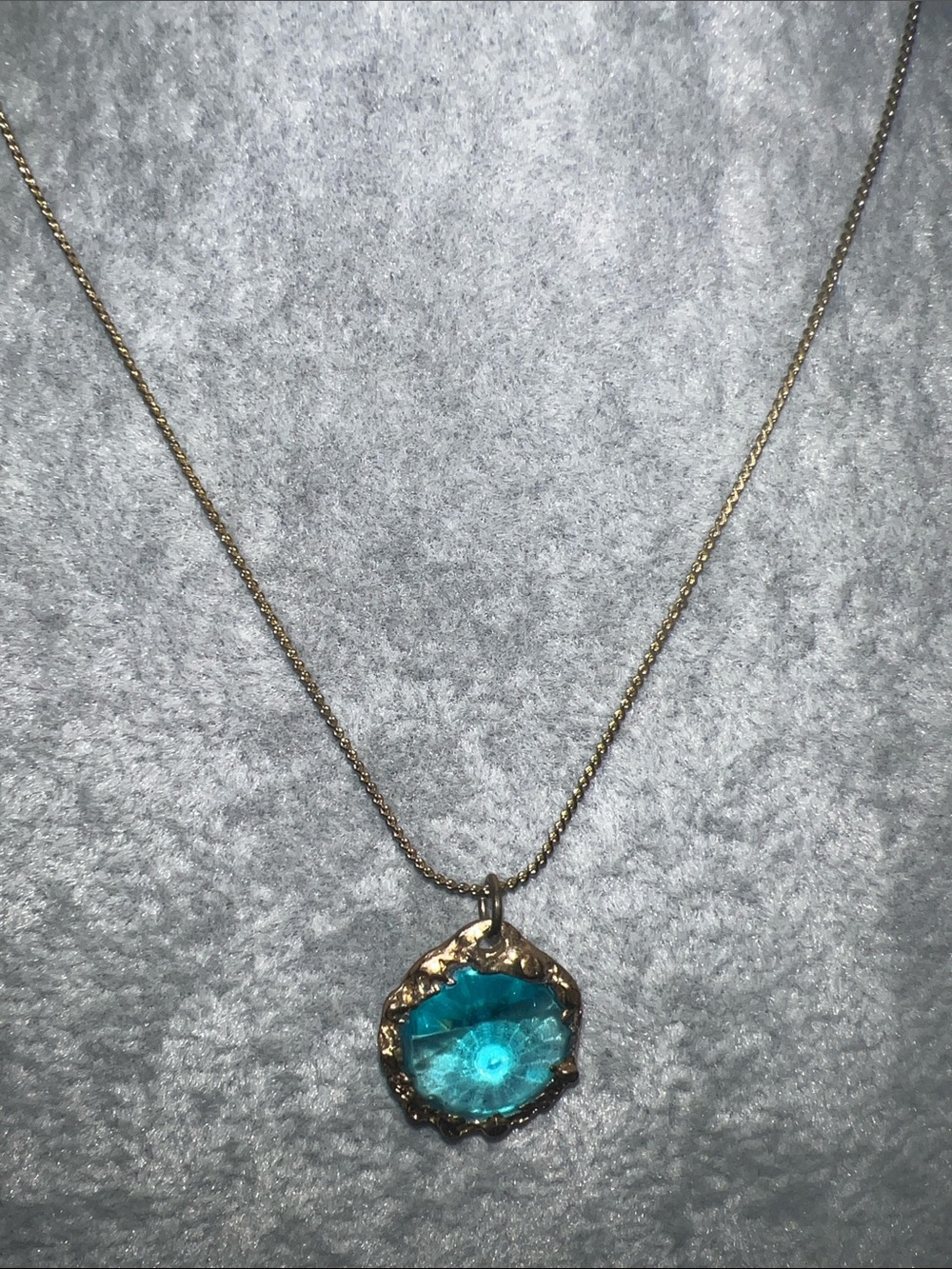 Gold-Tone Necklace with Turquoise Blue Crystal Pendant